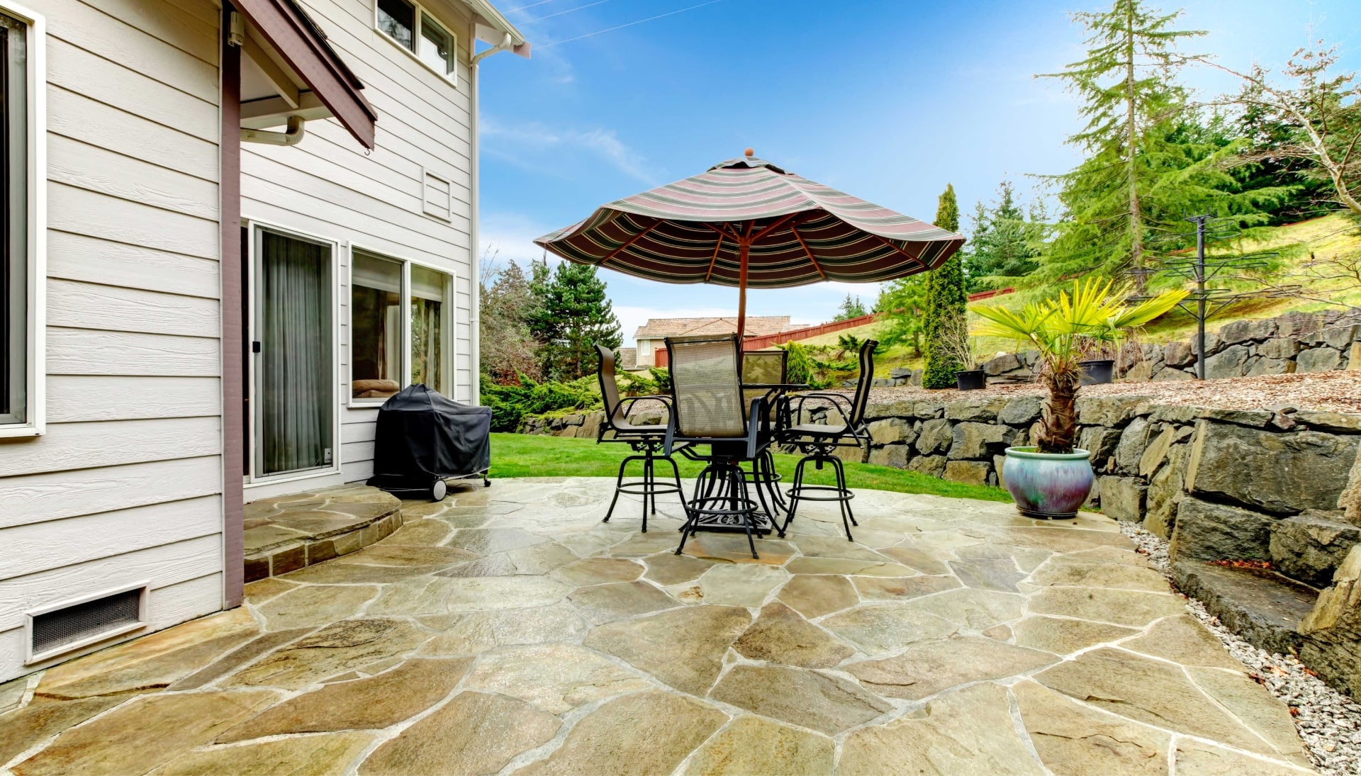 Create an Outdoor Oasis with Stunning Concrete Patio in Canton, OH - Enjoy Beautifully Textured and Patterned Concrete Surfaces for Your Entertaining and Relaxation Needs.
