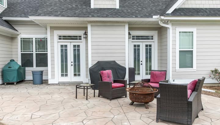 Elevate Your Outdoor Living Space with Stunning Stamped Concrete Patio in Canton, OH - Choose from a Variety of Creative Patterns and Colors to Achieve a Unique and Eye-Catching Look for Your Patio with Long-Lasting Durability and Low-Maintenance.